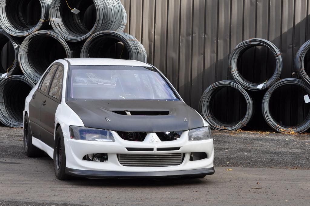 Seibon Carbon Fiber Hood OEM Style Dry for Evo 7/8/9 (HD0305MITEVO8-OE-DRY)