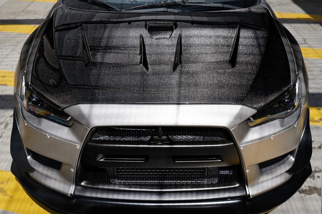 Seibon Carbon Fiber Hood DV Style Gloss for Evo X (HD0809MITEVOX-DV)